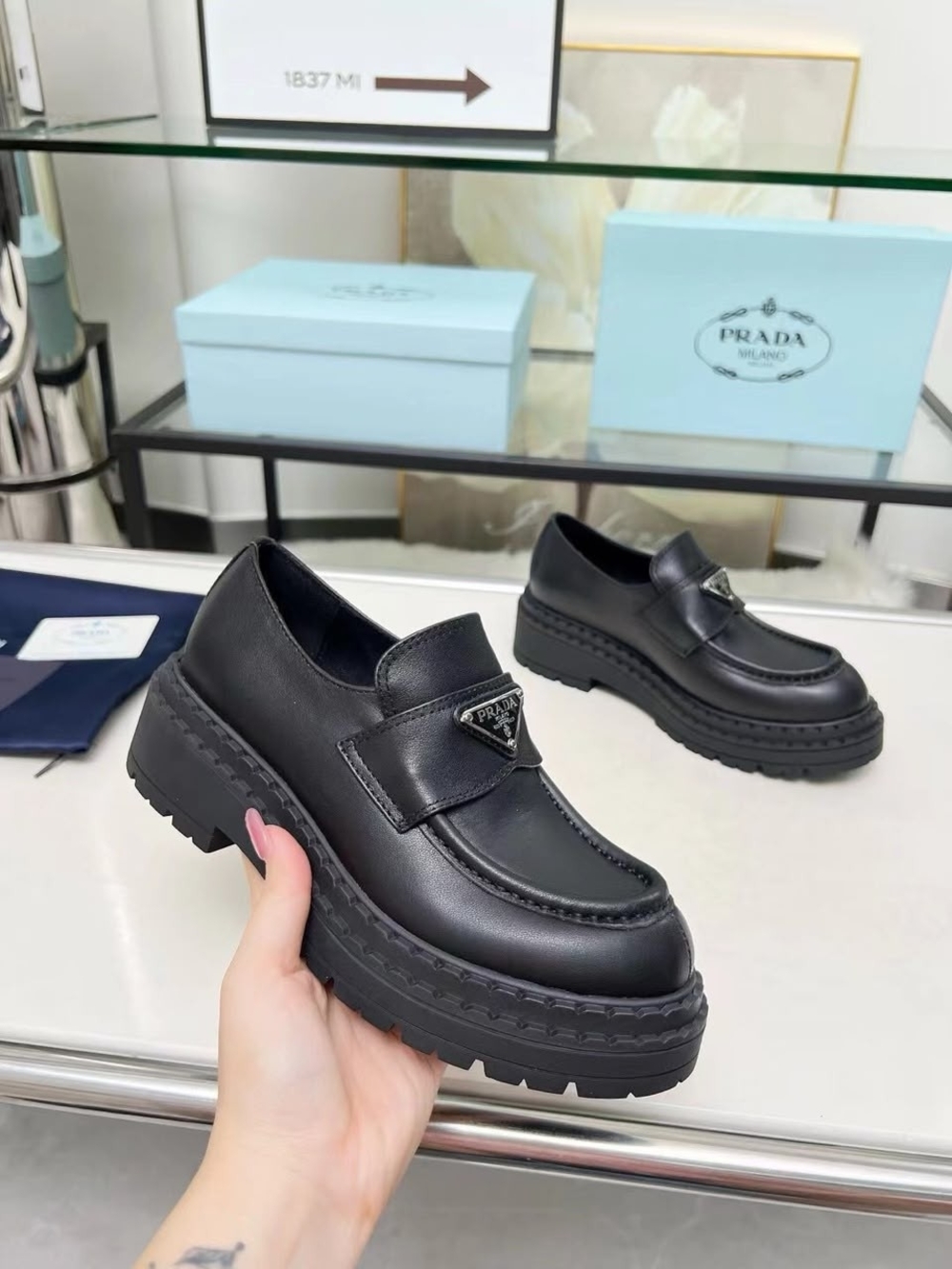 Prada Black Leather Platform Mules with Triangle Logo